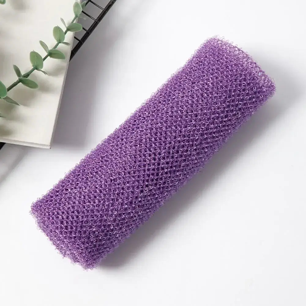 Purple exfoliating mesh sponge for smoother skin and effective cleansing, perfect for back scrubbing.